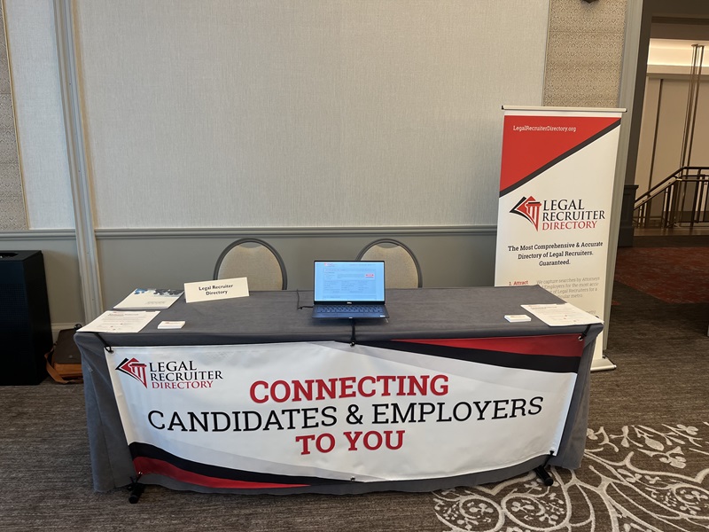 LRD Table at the 2024 NALSC Conference featuring banner that reads "Connection Candidates & Employers to You"